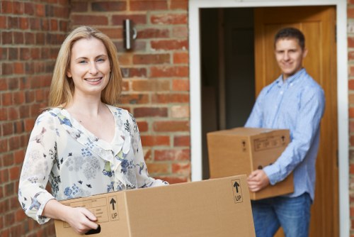 Staff or customer handling storage items safely in a unit area